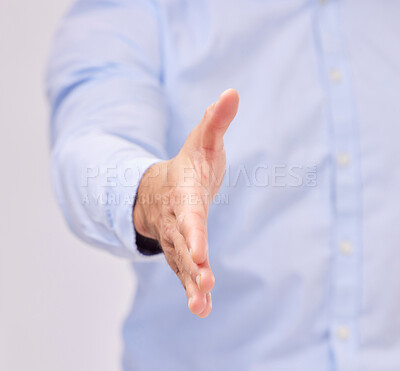 Buy stock photo Opportunity, welcome and business man with a handshake in studio for recruitment, onboarding or hiring. Partnership, collaboration and male professional shaking hands for contract, agreement and deal
