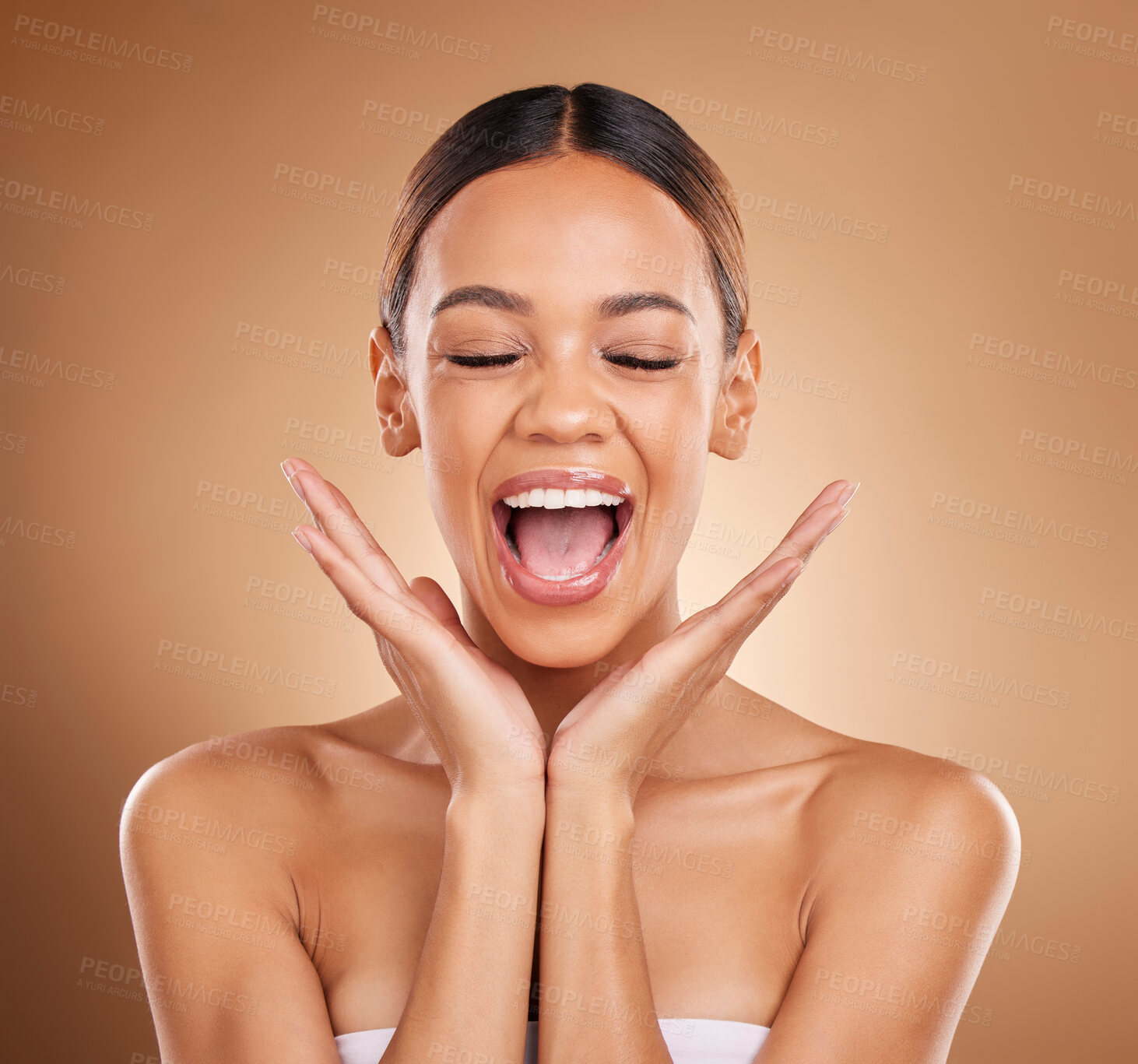 Buy stock photo Beauty, excited and a woman with hands on face for skin care glow and shine in studio on brown background. Aesthetic female model with eyes closed for spa facial, dermatology cosmetic and wellness 