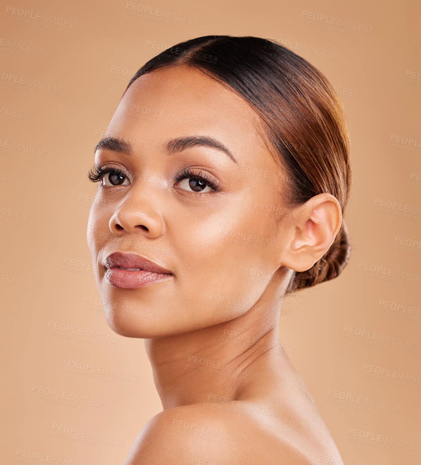 Buy stock photo Beauty, face and a woman in studio for skin glow and shine on brown background. Natural female model with makeup or spa facial, dermatology cosmetics and wellness with self care and skincare