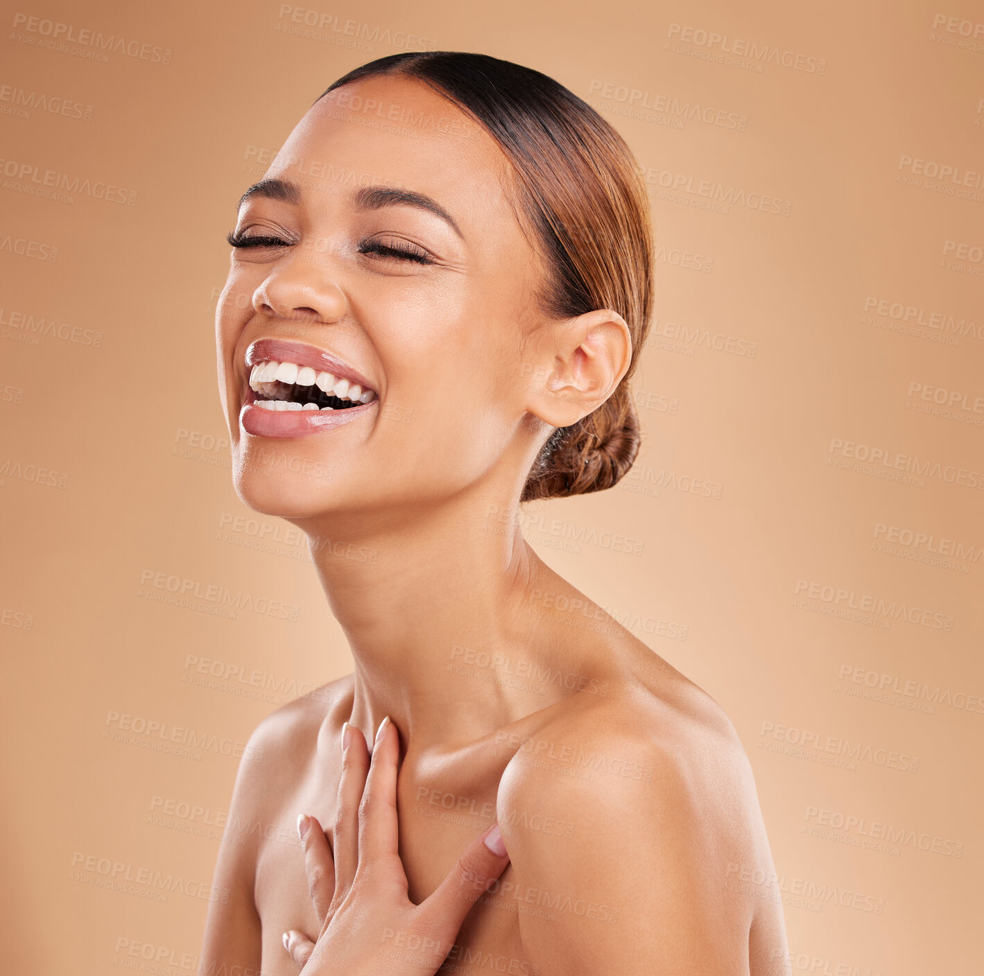 Buy stock photo Happy, beauty and a woman laughing for skin glow and shine in studio on a brown background. Face of aesthetic female model satisfied with spa facial, dermatology cosmetics and wellness with skincare