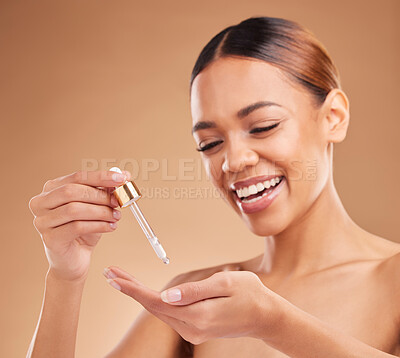 Buy stock photo Beauty serum, happy or model woman in studio on beige background for facial skincare in studio. Face smile or natural girl smiling with essential oils or glowing luxury self care hydration product