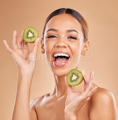 Buy stock photo Skincare, kiwi and portrait of woman with smile in studio for wellness, facial treatment and natural cosmetics. Beauty, organic spa and happy girl with fruit for detox, nutrients and healthy skin