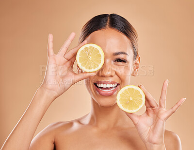 Buy stock photo Skincare, lemon in hands and face of woman with smile for wellness, facial treatment and natural cosmetics. Beauty, spa and happy girl with fruit slice for citrus detox, vitamin c and dermatology