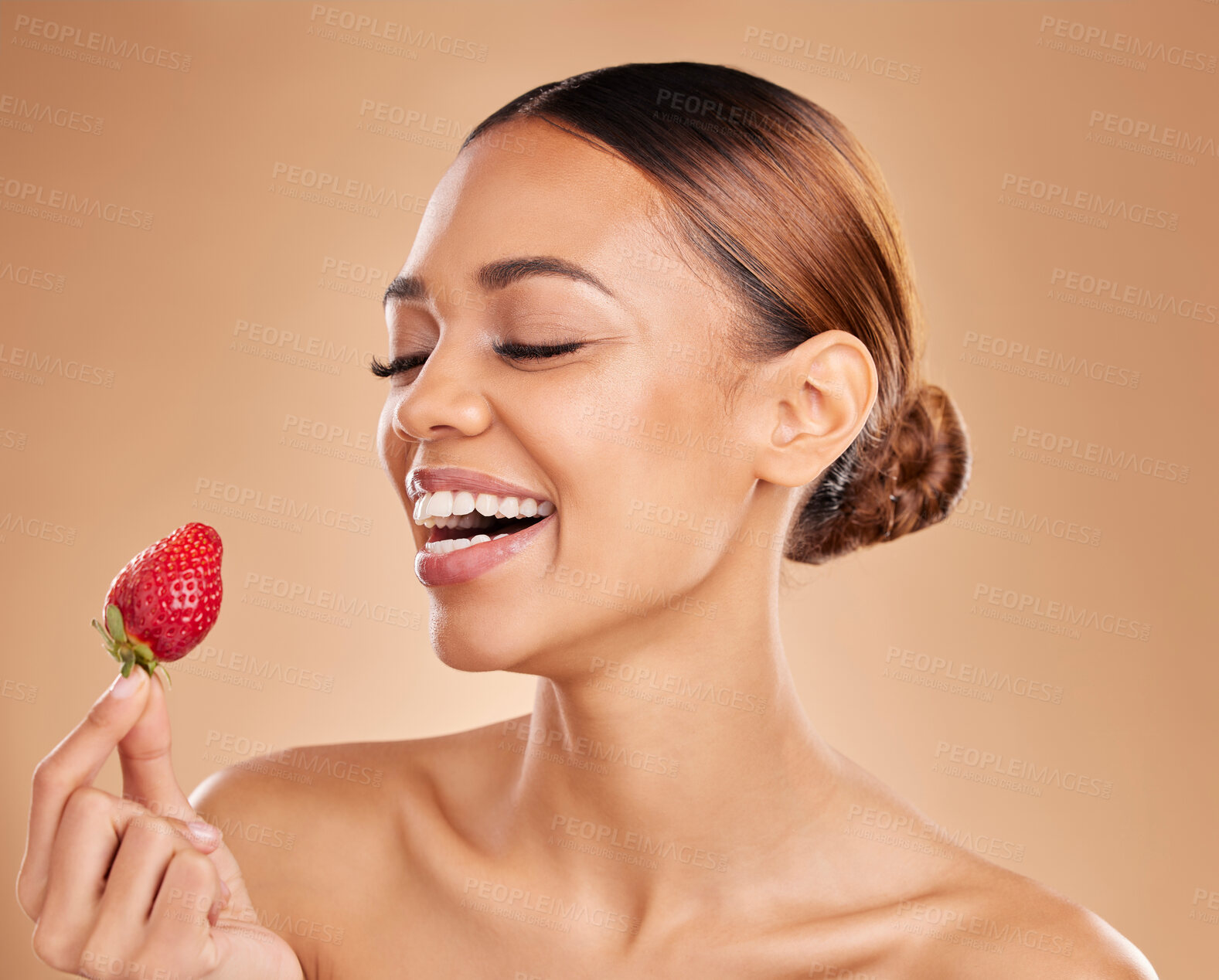 Buy stock photo Beauty, skincare or happy woman with strawberry in studio on beige background for healthy nutrition or clean diet. Smile, face or funny girl model laughing or marketing natural fruits for wellness 