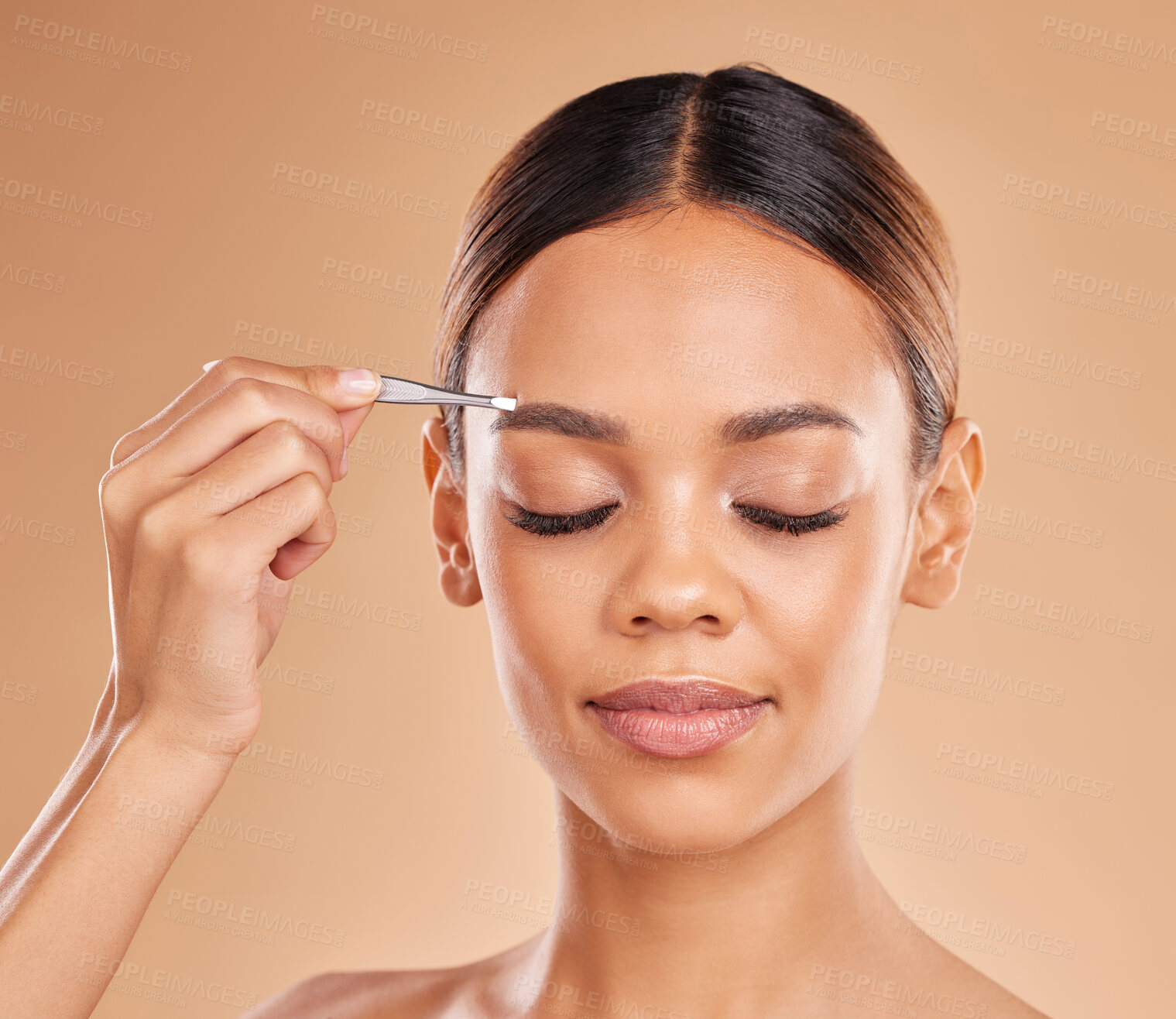 Buy stock photo Beauty, grooming and eyebrows with woman and tweezers in studio for clean, self care and cosmetics. Facial, plucking and shape with female model on brown background for hair removal and skincare