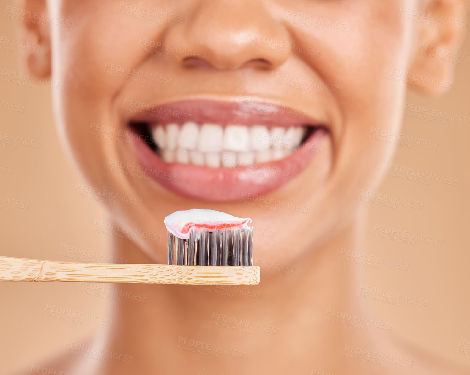 Buy stock photo Woman, teeth and big smile with toothbrush for dental care, hygiene or wellness against a studio background. Closeup of female mouth smiling with tooth paste for healthy or clean oral and gums