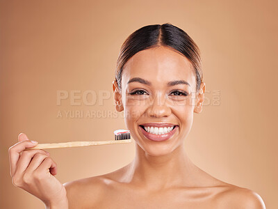 Buy stock photo Portrait, toothpaste or girl brushing teeth with product for healthy oral or dental hygiene in studio. Face model, smile beauty or happy woman cleaning mouth with a natural bamboo wooden toothbrush 
