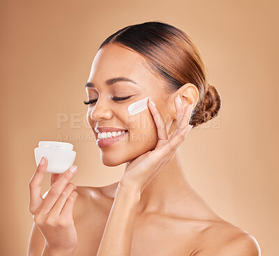 Buy stock photo Woman, skincare cream jar and studio for beauty, wellness or self care for face health by background. Girl, model and happy for cosmetic skin product for natural glow, collagen or dermatology benefit