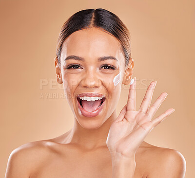 Woman, skincare cream and excited in portrait for beauty, wellness or self care by studio background. Girl, model or happy with cosmetic skin product for natural glow, collagen or dermatology benefit