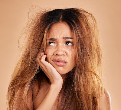 Buy stock photo Sad face, hair loss and woman in studio isolated on a brown background for thinking. Idea, keratin damage or angry female model with haircare, messy hairstyle or split ends after salon treatment fail