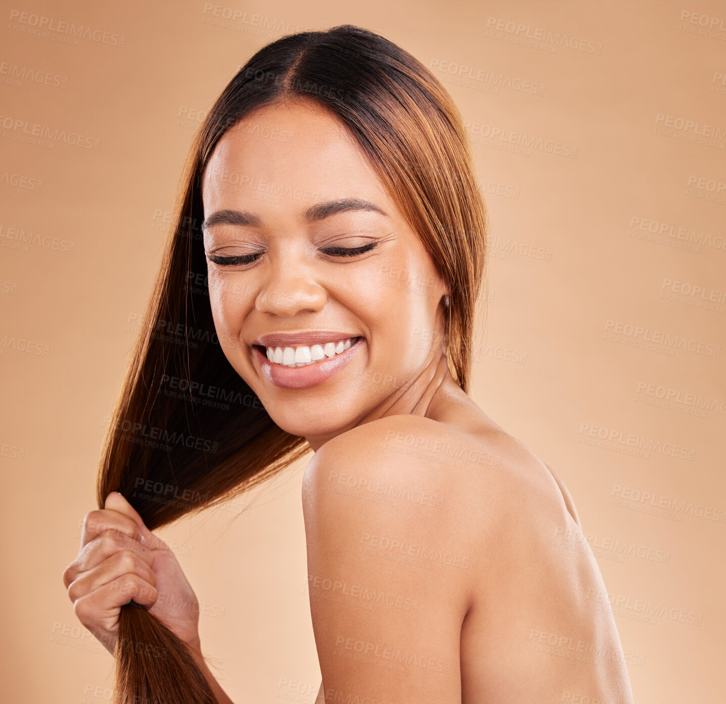 Buy stock photo Woman, beauty and hair care with a smile for growth and shine shampoo on a brown background. Aesthetic female happy in studio for natural keratin treatment and wellness with color and strong texture