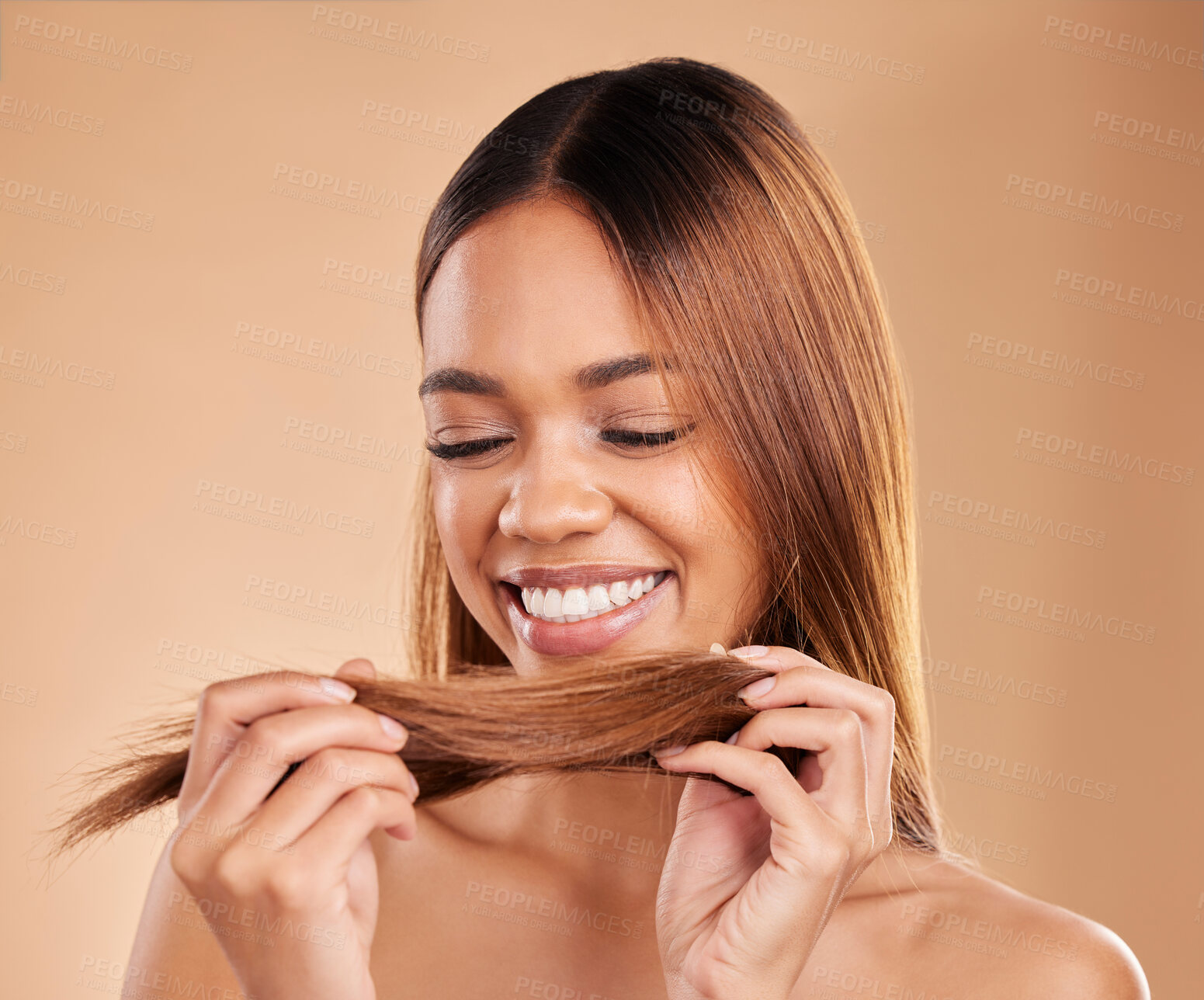 Buy stock photo Woman, beauty and hair care with a smile for growth, texture and shine shampoo on a brown background. Aesthetic female happy in studio for natural keratin treatment and wellness with color protect