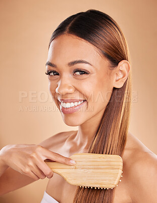 Buy stock photo Woman, beauty and hair brush portrait or smile for growth and shine for healthy texture on brown background. Aesthetic female happy in studio brushing for natural keratin treatment haircare results