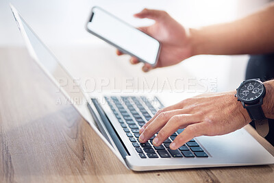 Buy stock photo Man, hands and laptop with phone mockup for digital marketing, advertising or social media on wooden desk. Hand of male typing on computer keyboard with smartphone screen in networking communication