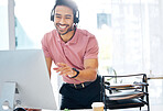 Asian man, call center and consulting with headphones on computer for customer service or desktop support at office. Happy male consultant agent talking with headset on PC for telemarketing or advice