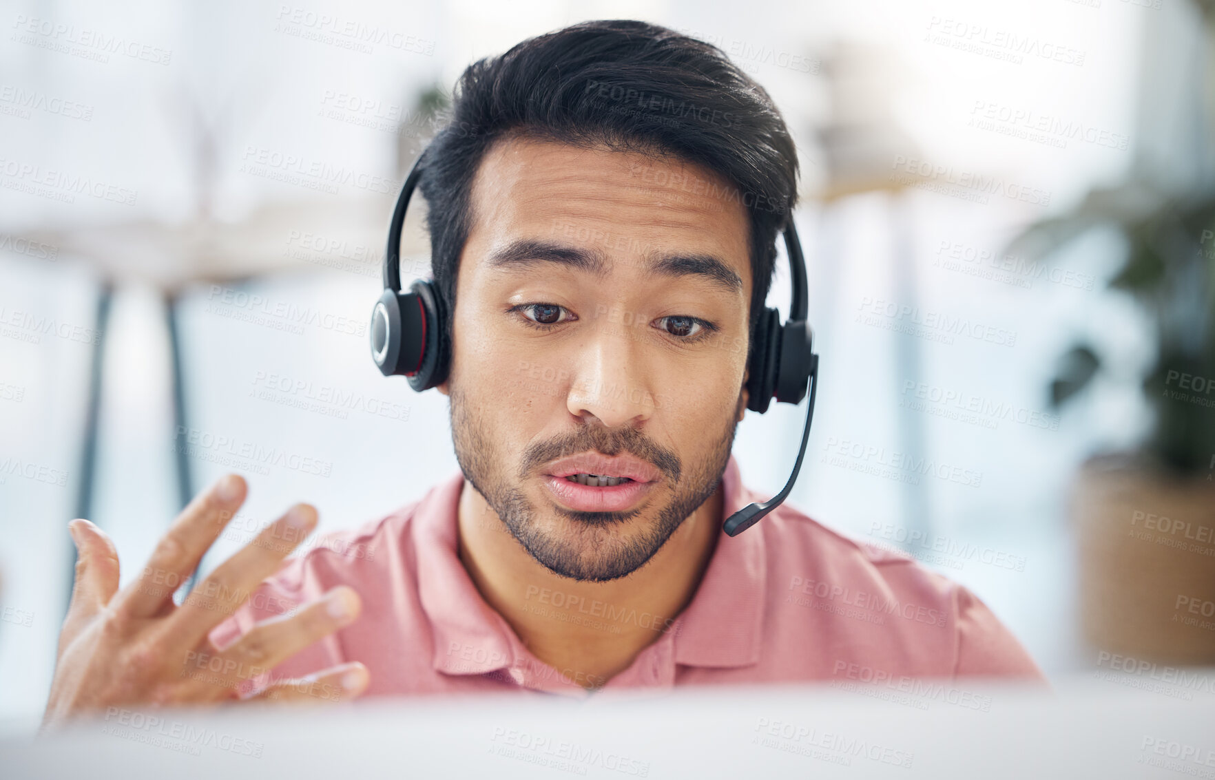 Buy stock photo Asian man, call center and consulting with headphones on computer for customer service, help or support at office. Male consultant agent talking with headset on PC for telemarketing or online advice
