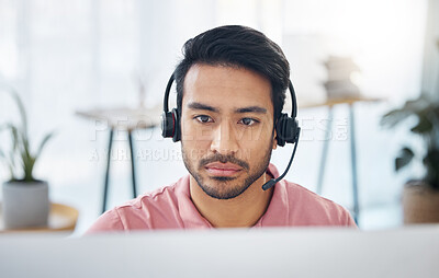 Buy stock photo Serious asian man, call center and headset on computer for consulting, customer service or support at office. Focused male consultant with headphones by desktop PC for telemarketing or online advice