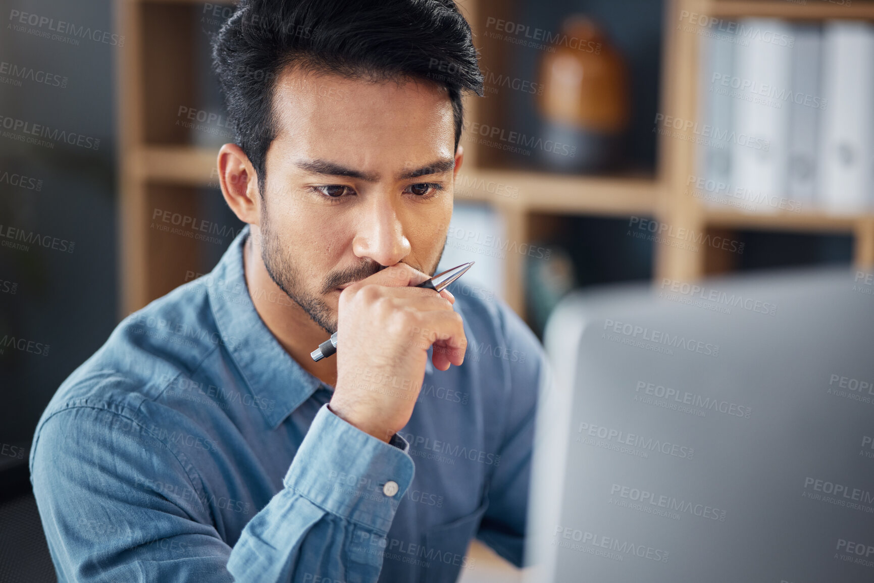 Buy stock photo Serious, business man and thinking on computer in office, internet research and website. Focused male employee, desktop and solution of ideas, planning decision and review strategy, project or vision