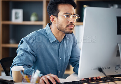Buy stock photo Serious, business man and confused on computer, internet research and website. Focused male employee, desktop and problem solving solution, planning and review strategy, project and reading email