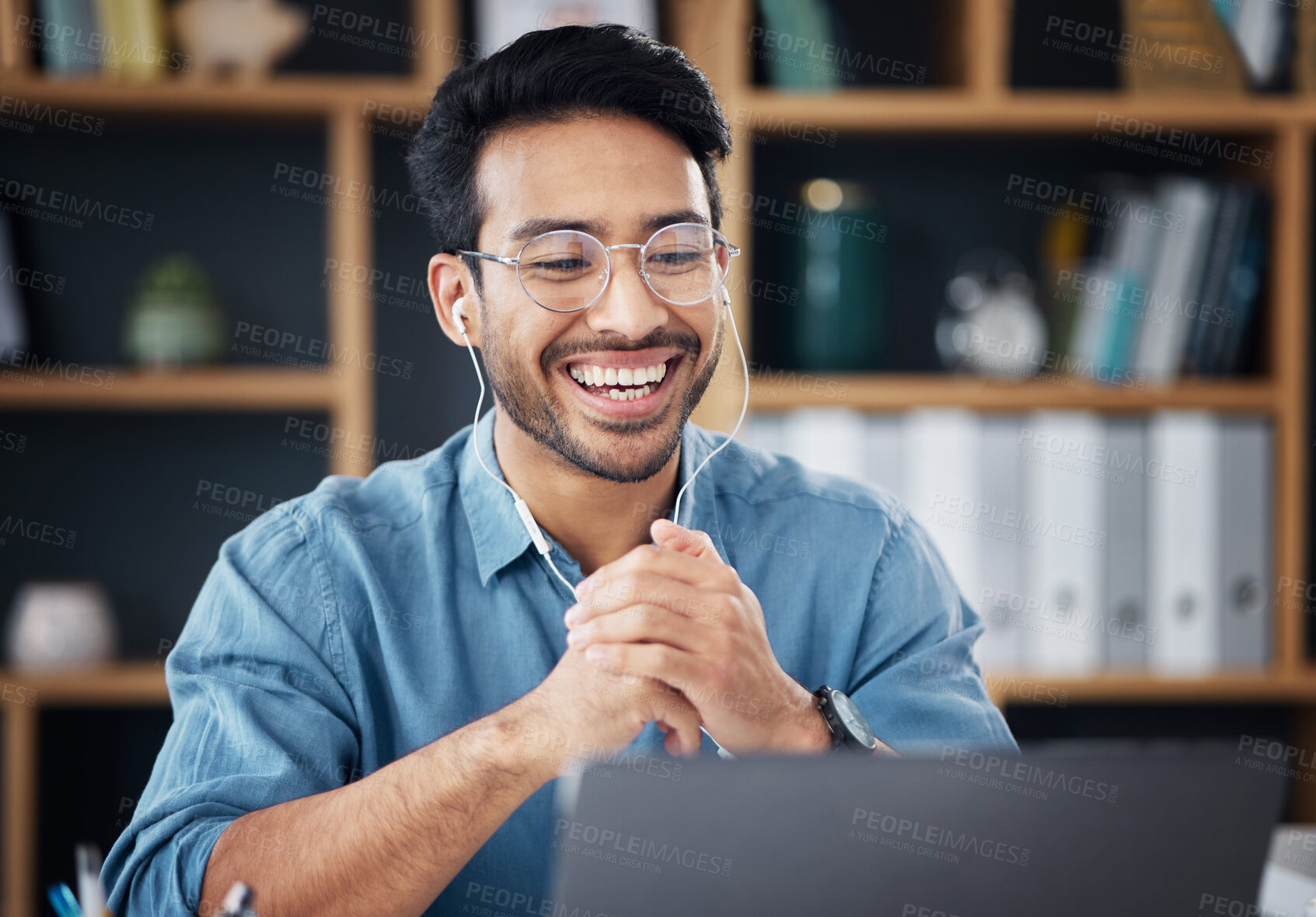 Buy stock photo Happy asian man, laptop and smile on video call for communication with earphones at the office desk. Male employee smiling for webinar, virtual meeting or networking on computer at the workplace