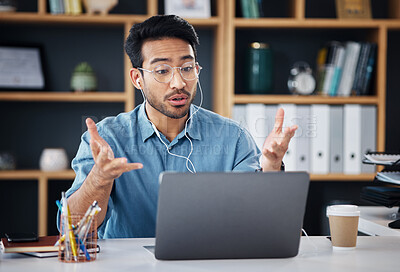 Buy stock photo Asian man, laptop and consulting in video call for communication with earphones at office desk. Male employee talking or explaining in webinar, virtual meeting or networking on computer at workplace