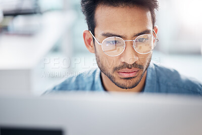 Buy stock photo Serious, computer and business man in office for idea research, contemplating and planning. Website, technology and digital with male employee reading online for proposal, project and email news