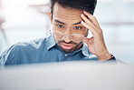 Asian man, frustrated and tired with laptop in office for glitch, problem or anxiety for proposal, idea or burnout. Businessman, computer and thinking with stress, depressed or headache for 404 error