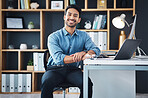 Relax, laptop and portrait of startup founder smile and sitting in company office excited for the future. Young, happy and professional business man, employee or worker feeling confident and proud