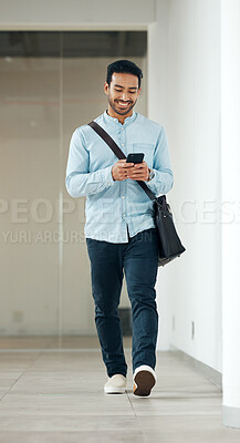 Buy stock photo Phone, walking and young man typing on online communication, networking or reading social media post. Asian man or worker on smartphone, cellphone or mobile app chat for website, opportunity or news