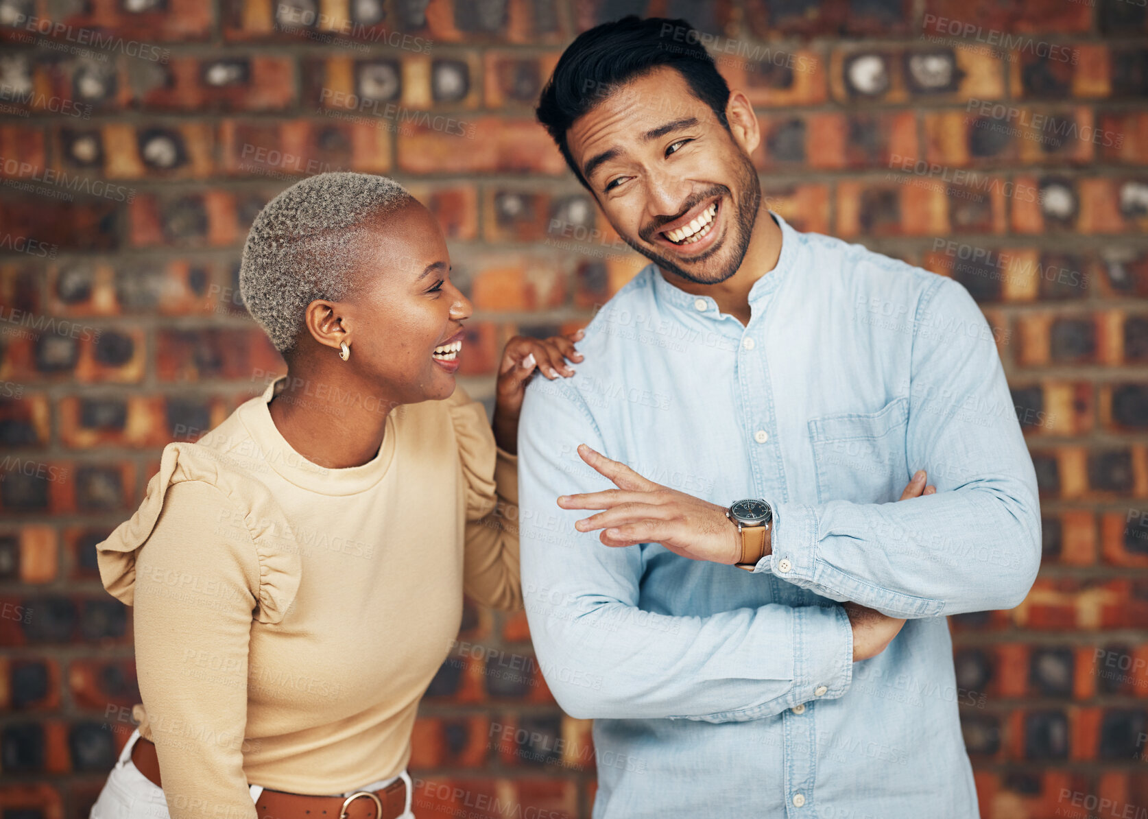 Buy stock photo Young, professional team and partnership, laugh with teamwork and friends against wall background. Happy working together, creative pair and diversity, black woman and man, collaboration and trust