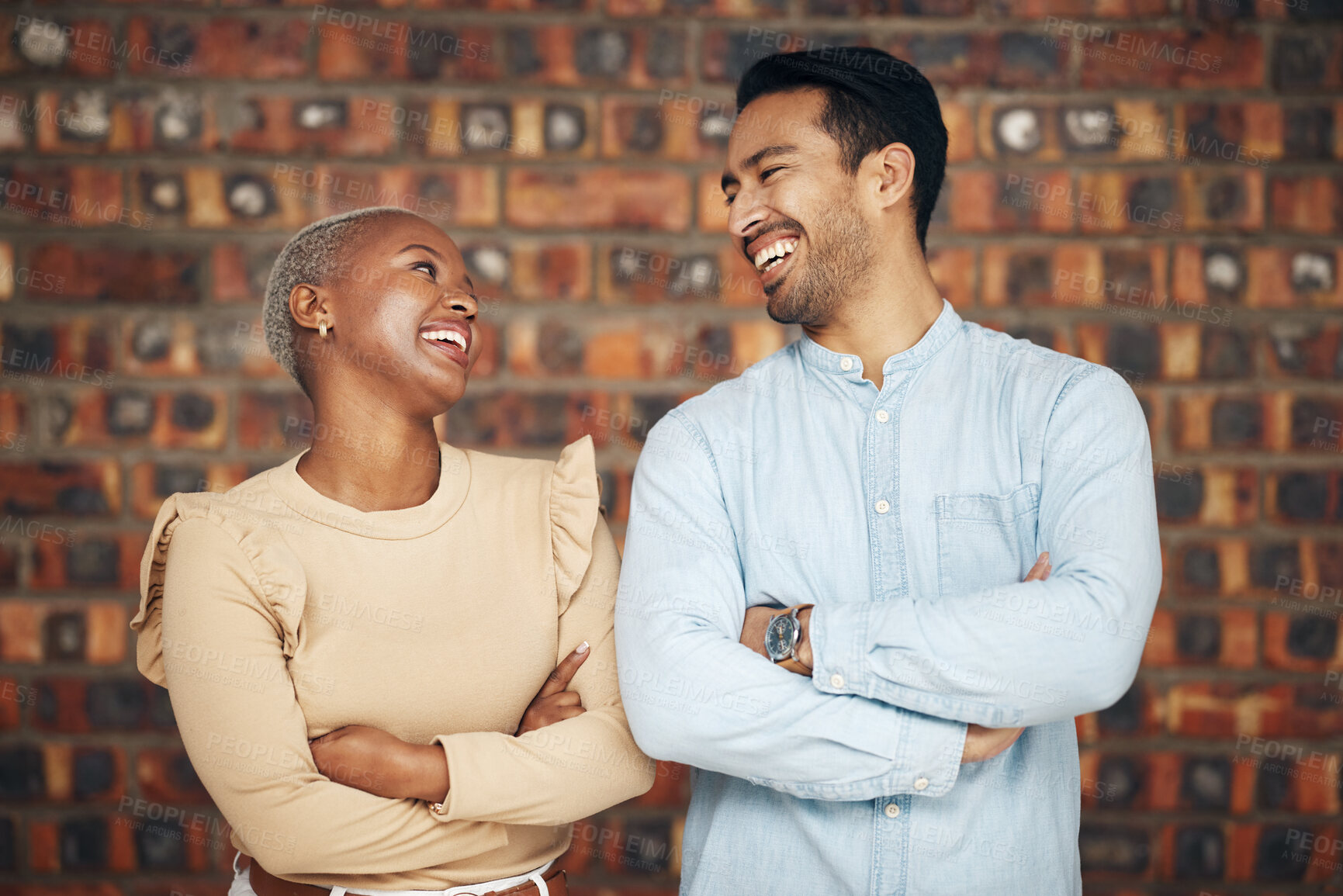Buy stock photo Teamwork, arms crossed and business people laughing in office workplace at funny joke or comedy. Collaboration, comic diversity and happy man and black woman together for team building and confidence
