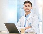 Laptop, doctor and portrait of man in hospital at desk for internet, telehealth app and medical research. Healthcare, insurance and serious health worker in clinic for consulting, medicine and online