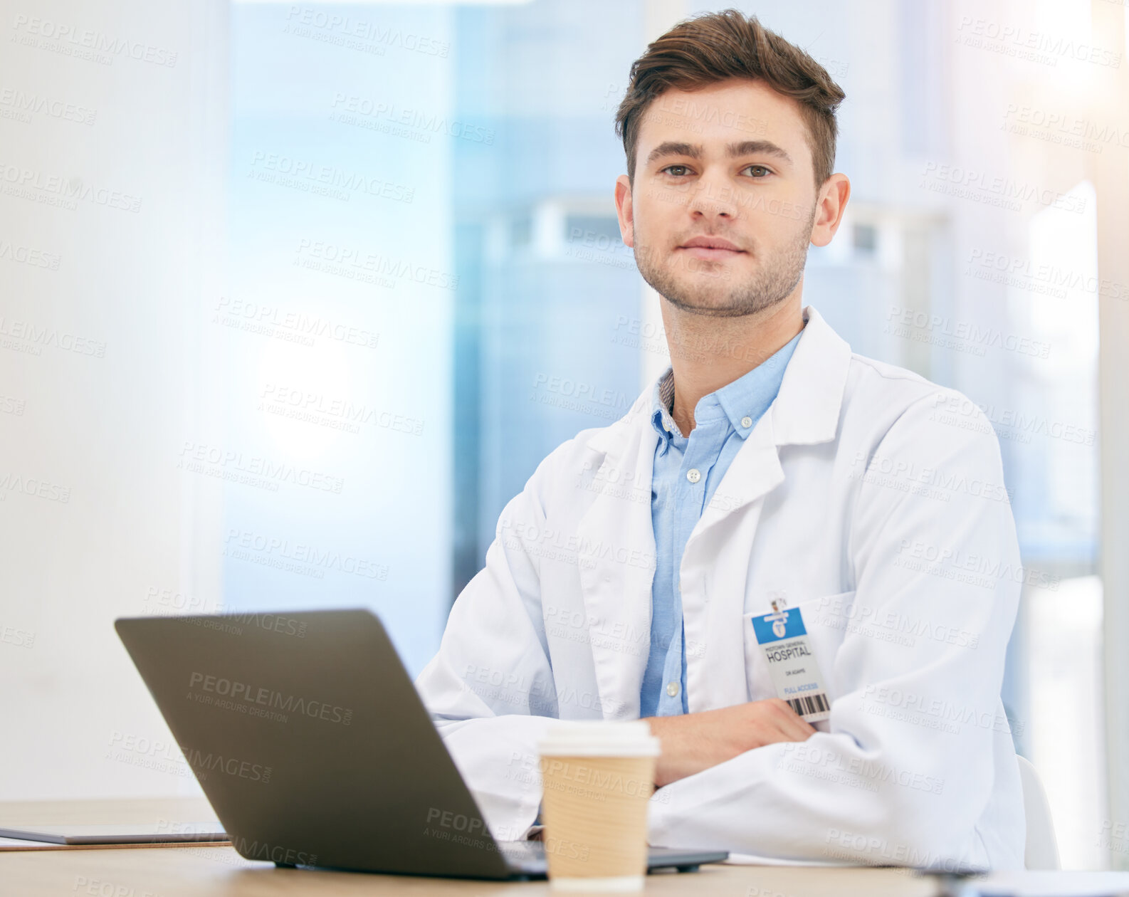 Buy stock photo Laptop, doctor and portrait of man in hospital at desk for internet, telehealth app and medical research. Healthcare, insurance and serious health worker in clinic for consulting, medicine and online
