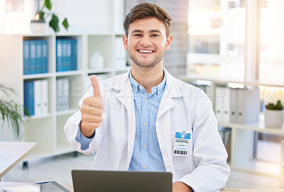 Buy stock photo Thumbs up, doctor and portrait of man in hospital office with laptop for wellness, telehealth and medical research. Healthcare, hand emoji and happy health worker for consulting, yes sign and support