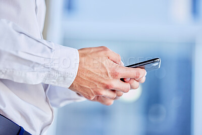 Buy stock photo Hands, phone and texting with a business man in his office, closeup for communication or networking. Mobile, contact and internet with a male employee typing a text message or making a call