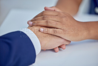 Buy stock photo Hands, support and love with people together offering comfort, care or trust during grief or pain. Table, help and empathy with a couple sharing kindness in a show of bonding, solidarity or unity