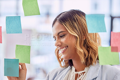 Buy stock photo Planning, brainstorming and woman writing on glass board for project management, workflow and job schedule. Creative worker or indian person with sticky note ideas for career strategy or goals