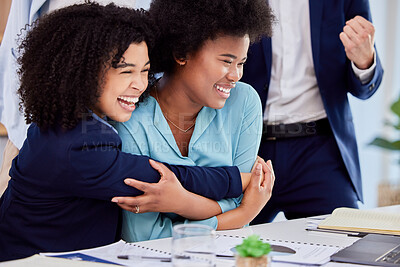 Buy stock photo Business woman, friends and hugging in congratulations for promotion, sale or bonus at the office desk. Women hug in celebration for corporate success, teamwork or support for winning or achievement