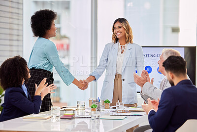 Buy stock photo Applause, business people and handshake in office for welcome, thank you or hiring in meeting. Team, collaboration and women shaking hands for integration, synergy or deal, partnership and promotion 