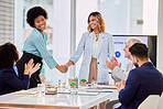 Business people, applause and handshake in office for thank you, welcome or hiring in office. Team, collaboration and women shaking hands for integration, synergy or deal, partnership and promotion 