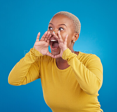 Buy stock photo Screaming, announcement and loud with a black woman on a blue background in studio for news or communication. Hand, shouting or message and a young female yelling to alert danger with her voice