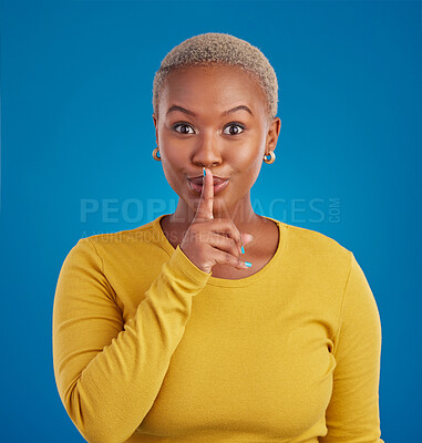 Buy stock photo Shush, secret and portrait of black woman in studio for secret, announcement and news. Silence, mystery and privacy with female isolated on blue background for rumor, gossip and  confidential