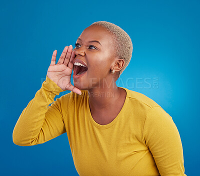 Buy stock photo Shouting, announcement and loud with a black woman on a blue background in studio for news or communication. Hand, screaming and message with an attractive young female yelling to alert danger