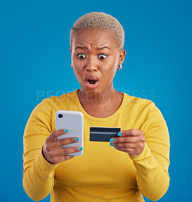 Buy stock photo Credit card, phone and woman shocked for online shopping mistake, transaction fail or debt isolated on blue background. Wow, surprise and stress person for fintech payment mistake on mobile in studio