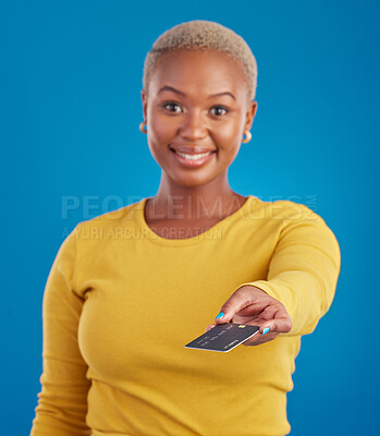 Buy stock photo Credit card, payment and woman portrait in a studio with a smile from paying with happiness. Isolated, blue background and ecommerce with a young female model hand showing financial banking method
