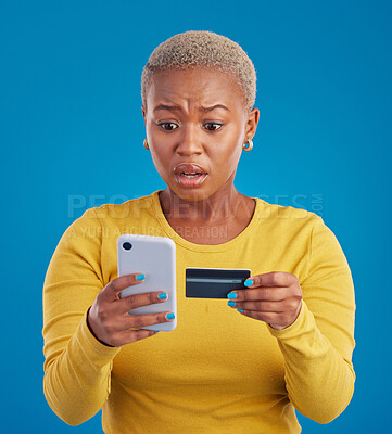 Buy stock photo Credit card, phone and worried woman online shopping mistake, transaction fail or debt isolated on blue background. Stress, anxiety and confused person fintech payment, hacking or phishing in studio