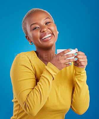 Buy stock photo Black woman, happy and coffee or tea portrait in studio with a smile and happiness. African female model with a drink and hands on cup to relax with a positive mindset on blue background with beauty