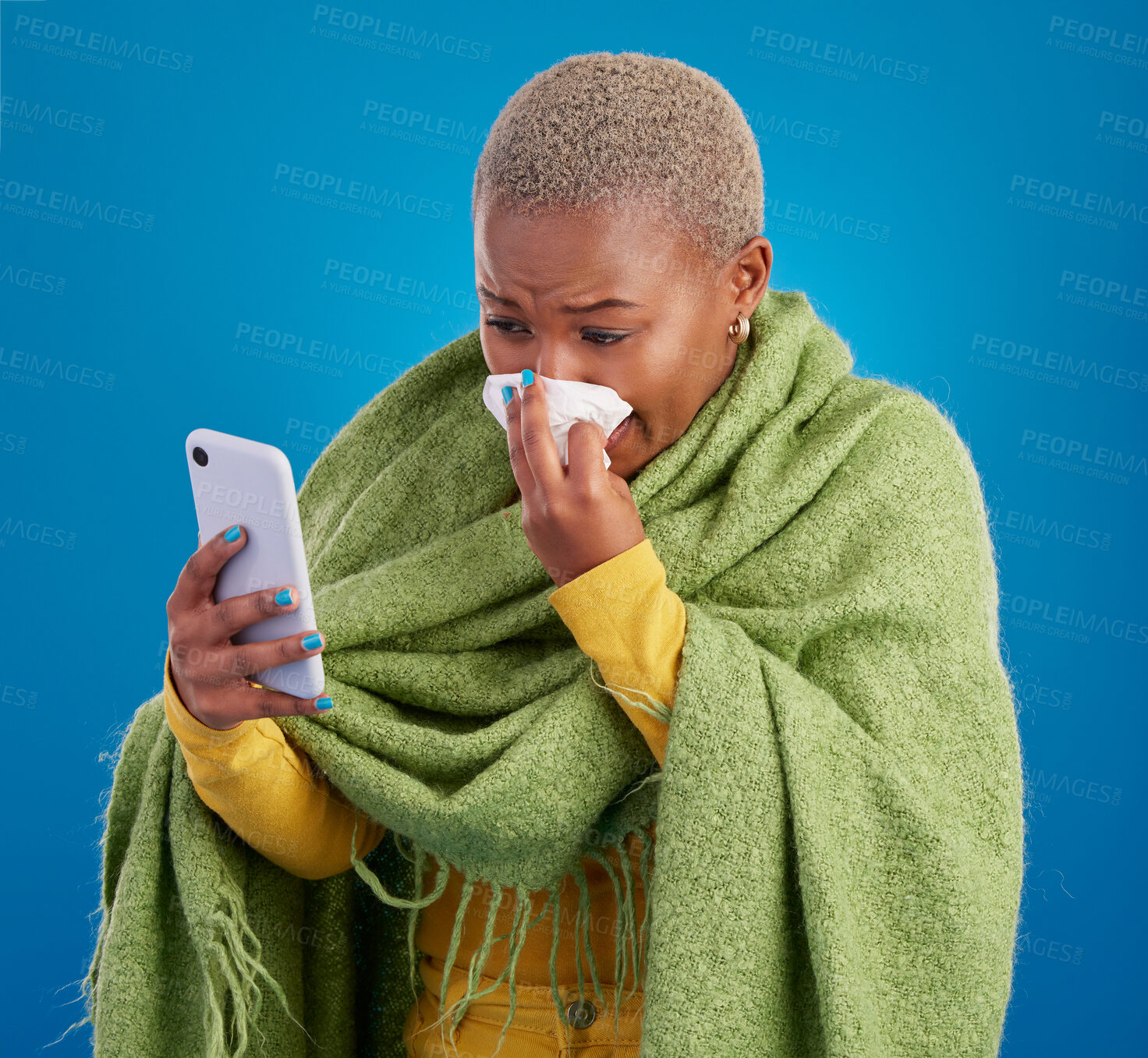 Buy stock photo Sick black woman, phone and blowing nose on background, studio and allergies from winter virus. Female model, influenza and smartphone for telehealth app, covid healthcare and search symptoms online