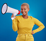 Black woman, megaphone and smile, portrait and voice, freedom of speech and activism on blue background. Happy female, broadcast and speak out, rally and protest, loudspeaker with opinion in studio