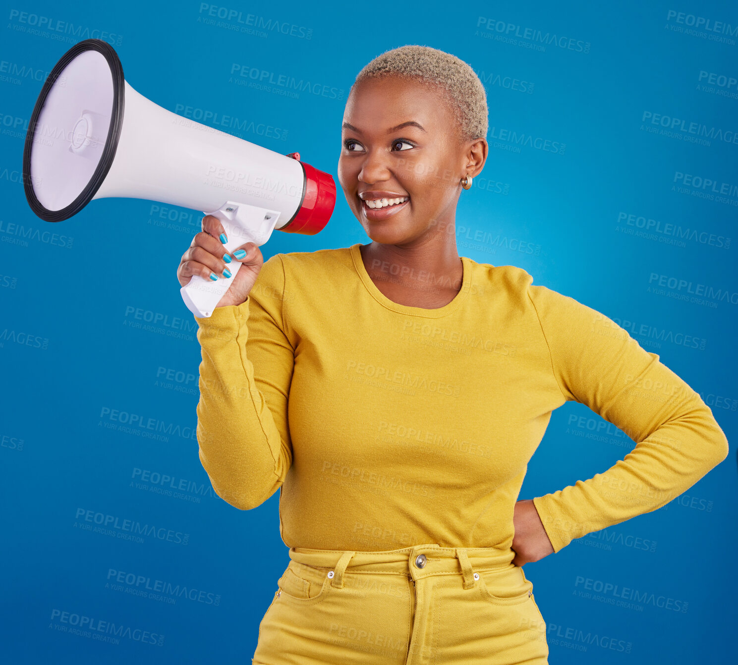 Buy stock photo Black woman, megaphone and smile, protest and voice, freedom of speech and activism on blue background. Happy female, broadcast and speak out, rally and activist, loudspeaker with opinion in studio